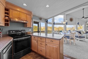 Fridge, microwave, oven, stovetop - 1880 - Sea Lark 1, Oceanfront with a Roof-Top Deck. Close to Shopping and Restaurants. (Corolla)