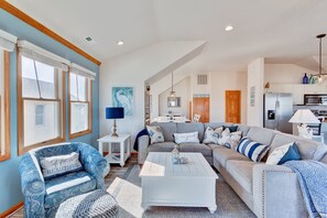 Flat-screen TV, fireplace, DVD player, books