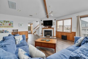 Flat-screen TV, fireplace, DVD player, foosball