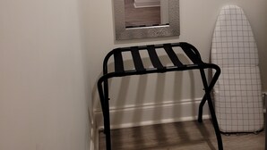 A bathroom with a shower, a mirror, and a towel rack. - FAB Studio Near Capitol, Hospitals, & Fair Grounds (Jackson)