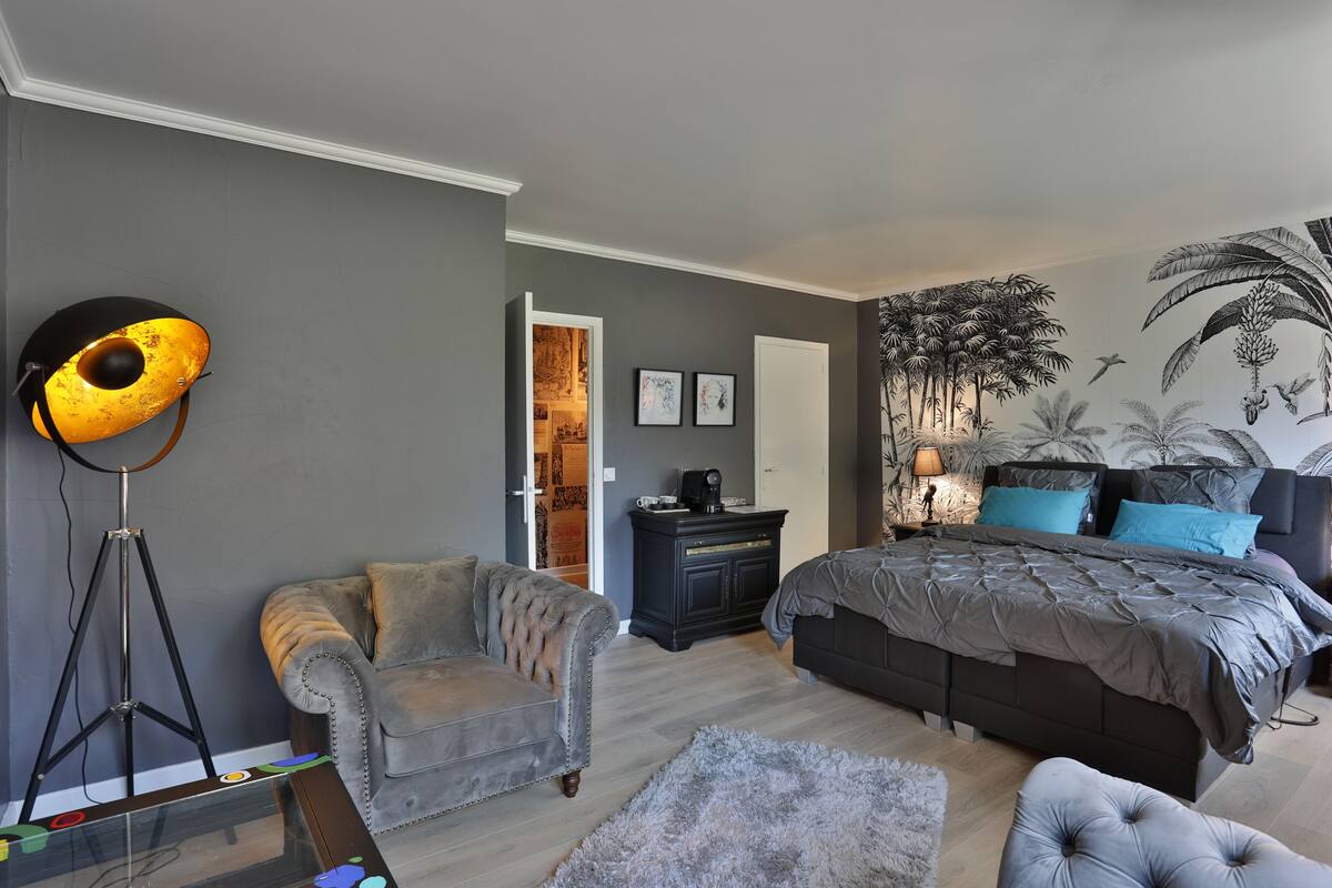 Family Suite | Hypo-allergenic bedding, in-room safe, blackout curtains, travel cot