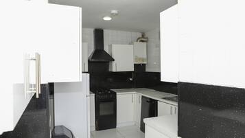 House, Multiple Beds | Private kitchen | Fridge, microwave, oven, stovetop