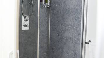 House, Multiple Beds | Bathroom | Combined shower/bathtub, deep-soaking bathtub, hair dryer, towels