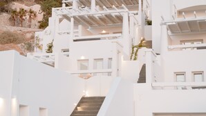 A modern building with a staircase leading to upper floors.