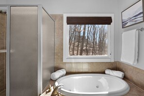 Combined shower/tub, hair dryer, towels, soap