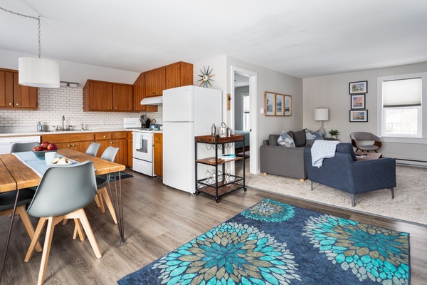 Walk in from the deck to a beautiful newly renovated open living/kitchen space.