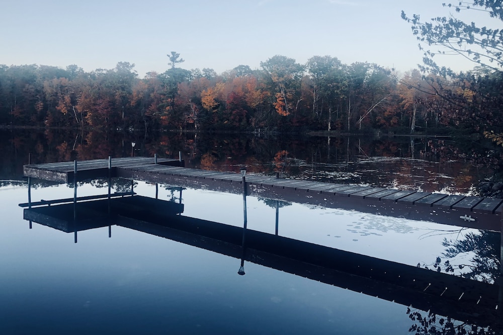Secluded cabin on a lake, right on snowmobile trail