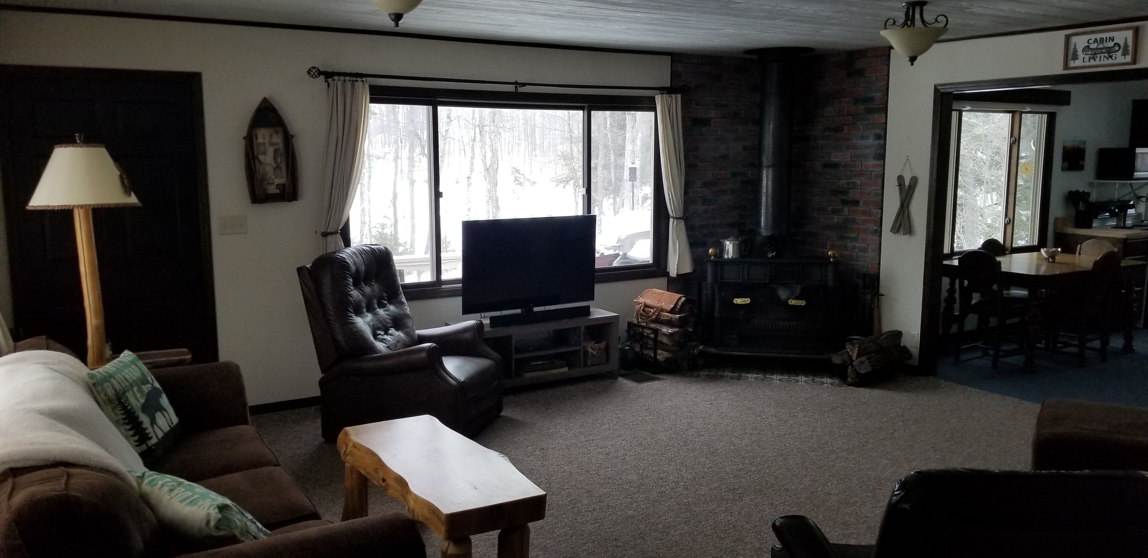 Secluded cabin on a lake, right on snowmobile trail