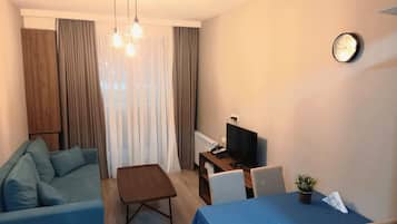 Suite Studio Confort | Coin séjour