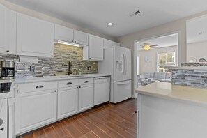 Fridge, microwave, oven, stovetop - Updated 4BR Downtown South District w Skyline View (Raleigh)