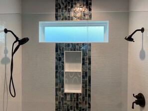 Combined shower/tub, hair dryer, towels, soap