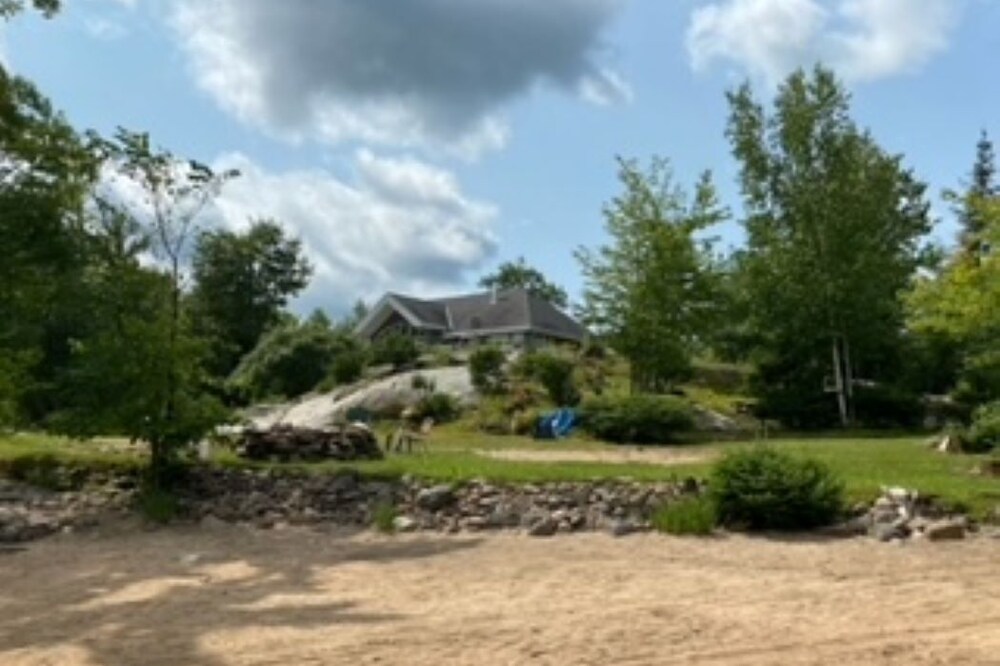 Water and Beach Front Property 4 season on Ottawa River with Private Boat Launch