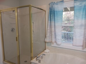 Combined shower/tub, hair dryer, towels, soap - Isle Time: Pet Friendly 3rd Row Duplex in Spinnaker's Reach (Emerald Isle)