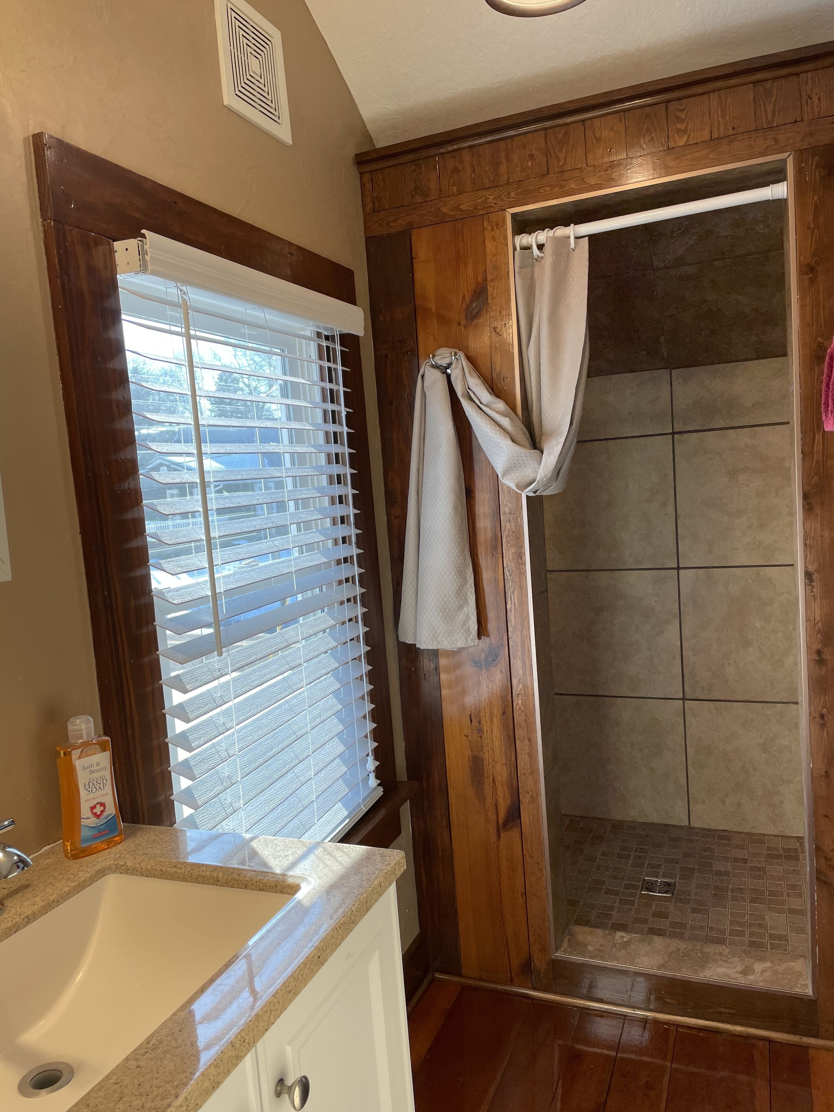 Shower, towels, soap, toilet paper
