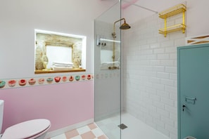 Bathtub, hair dryer, towels, soap