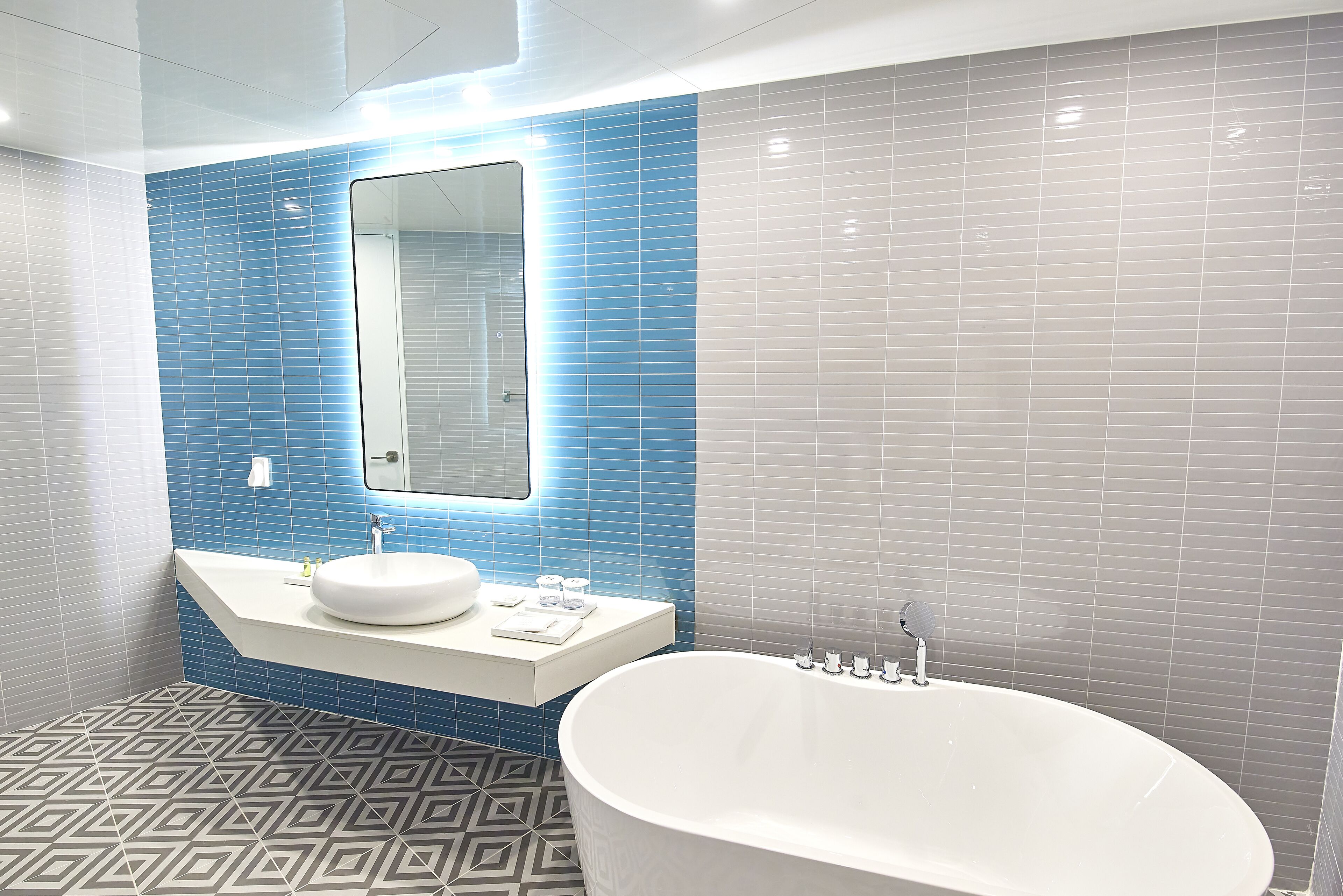 prime suite family | bathroom | hair dryer, bathrobes, slippers, towels