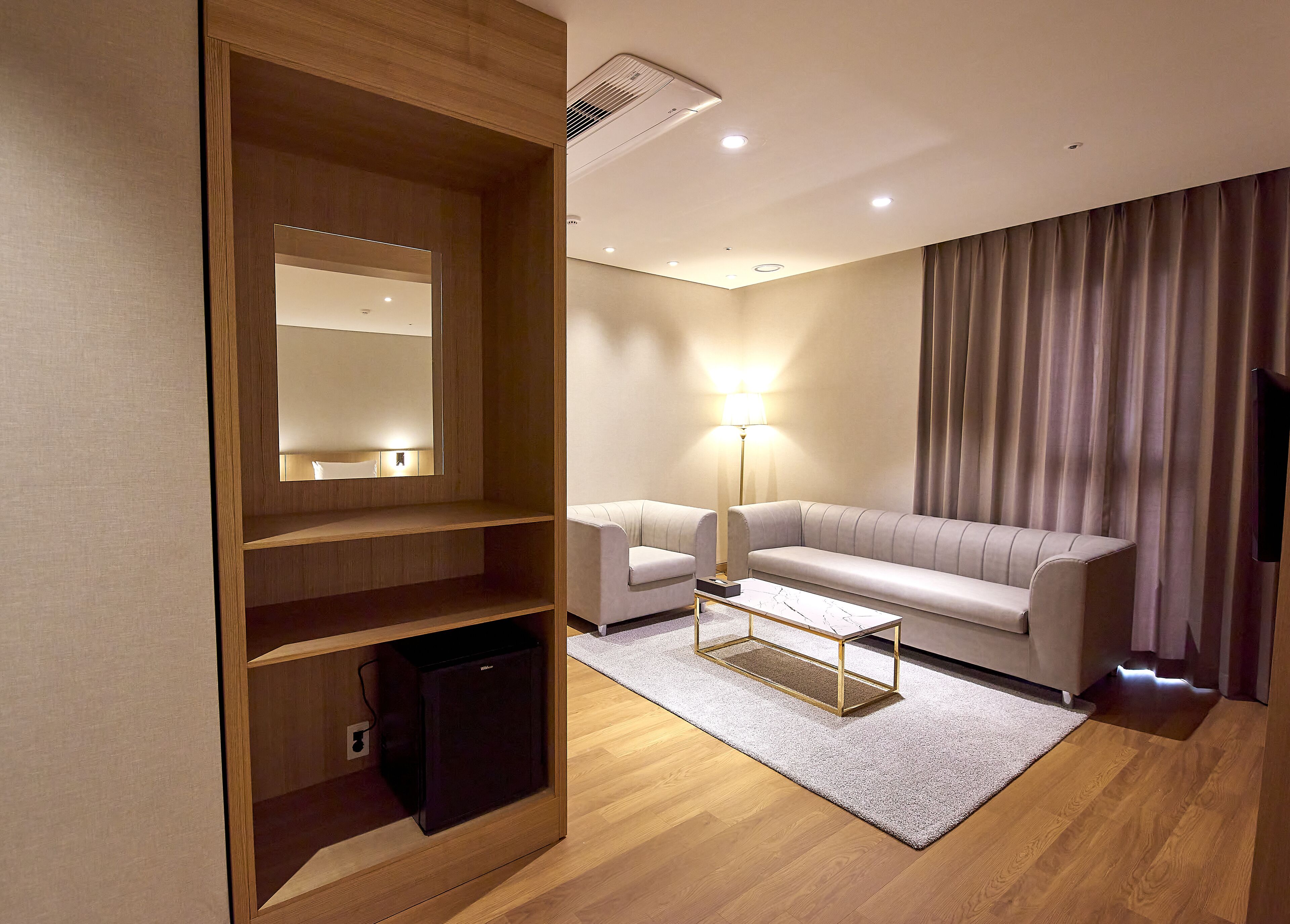 Suite Quadruple | Living area | 43-inch LCD TV with digital channels