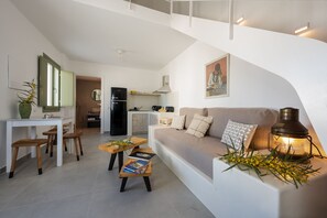 Premium Sea View Villa with Private Pool | Living area | Flat-screen TV - Oia Kissiri - private pool Villas (Santorini)