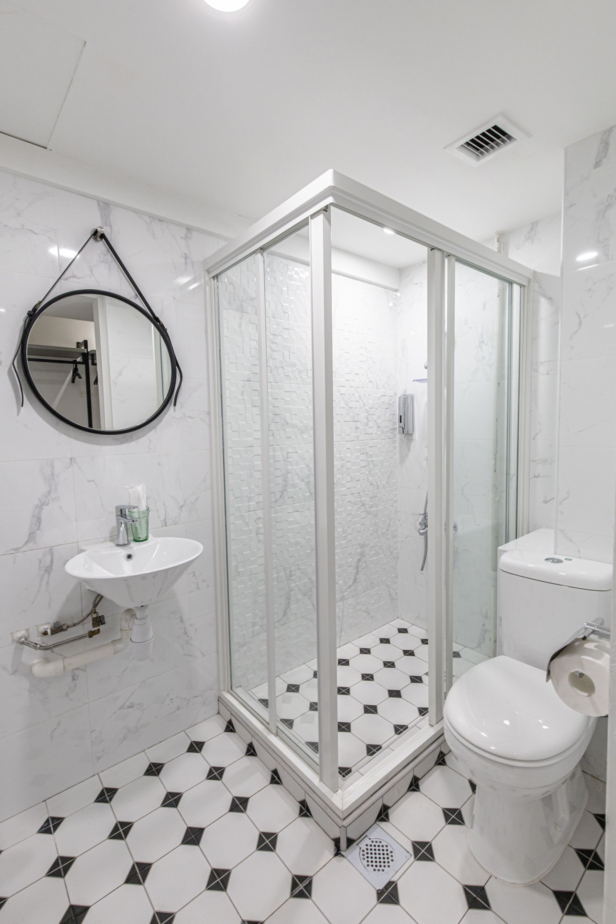 Shower, free toiletries, hair dryer, slippers