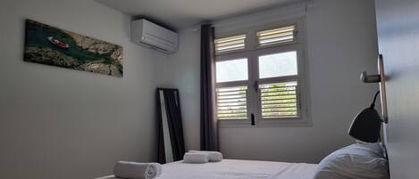 1 dormitorio, tabla de planchar con plancha, cuna de viaje y wifi gratis