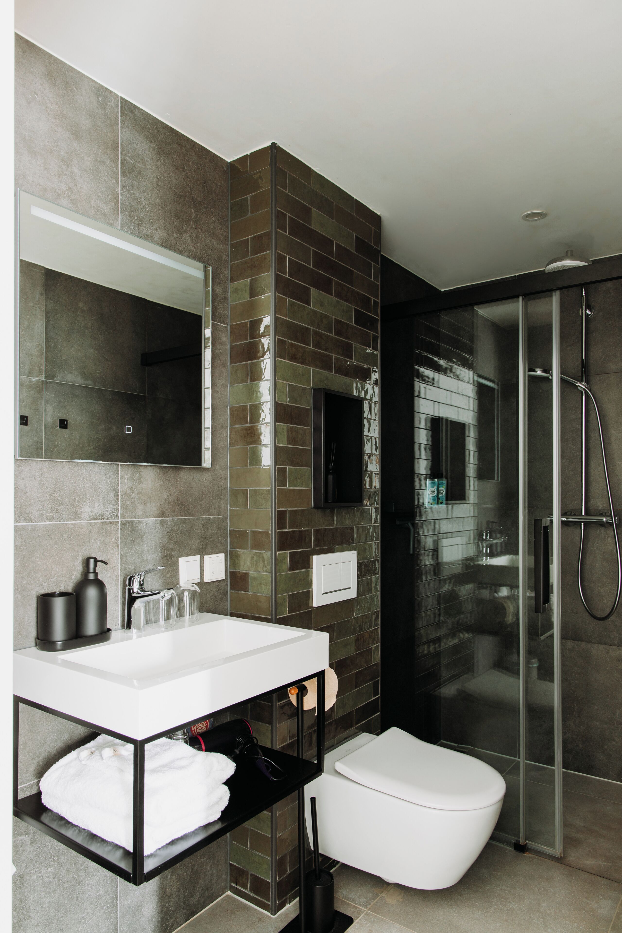 Shower, rainfall showerhead, eco-friendly toiletries, hair dryer