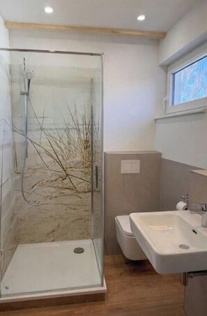 Douche, serviettes fournies