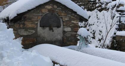 Au coeur d'un village montagnard, préservé, accueillant et fleuri
