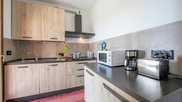 Family House, Multiple Bedrooms (Villa Teresa Apt Lake Garda View) | Private kitchen | Fridge, microwave, oven, stovetop