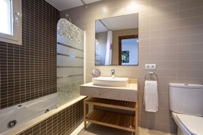 Bathtub, hair dryer, towels