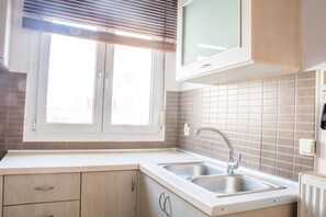 Basic Apartment | Private kitchen | Full-size fridge, oven, stovetop, cookware/dishes/utensils - Jenny Apartment (Zakynthos)