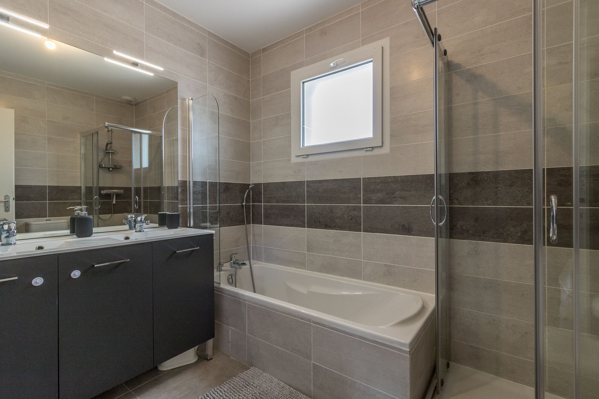 Bathtub, hair dryer, towels