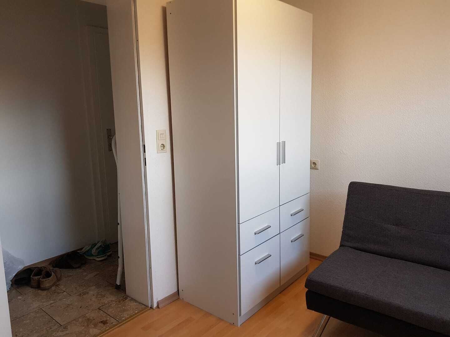 Apartment | Living room | 30-inch TV with cable channels