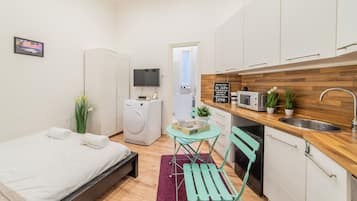 Departamento básico | 1 habitación, tabla de planchar con plancha, wifi gratis y ropa de cama