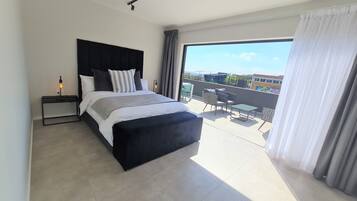 Attico Executive | Copriletto in piuma, cassaforte in camera, con stile personalizzato