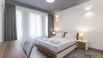 In-room safe, desk, laptop workspace, blackout curtains