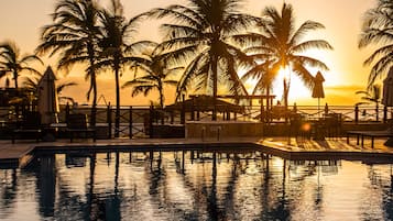 Outdoor pool, pool umbrellas, sun loungers