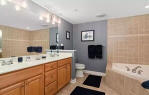 Combined shower/tub, jetted tub, hair dryer, soap