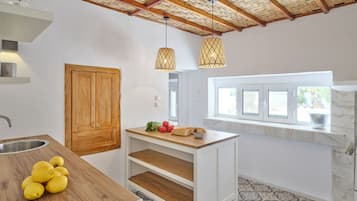 Traditional House, 1 Bedroom, Sea View | Private kitchenette | Mini-fridge, coffee/tea maker, cookware/dishes/utensils, dining tables