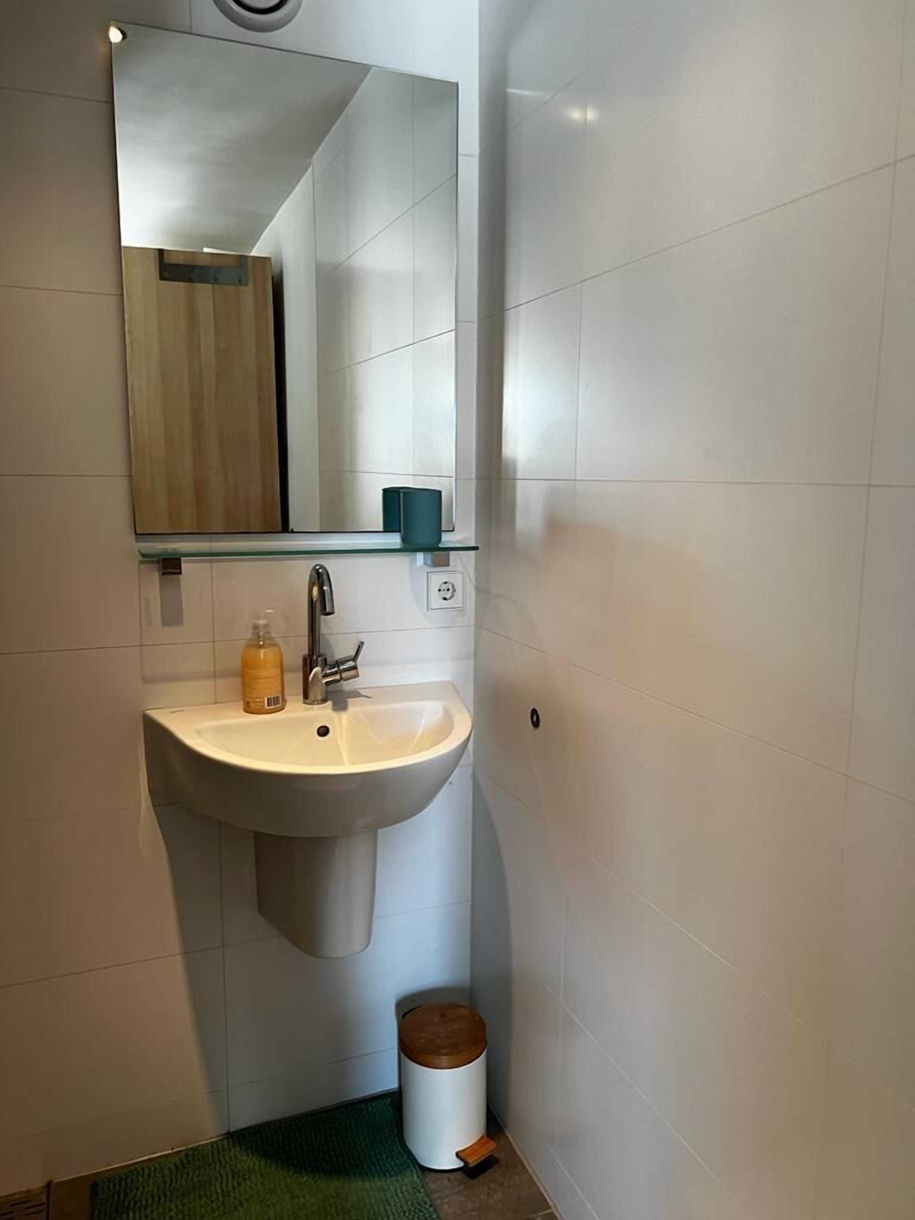 Shower, towels, soap, toilet paper