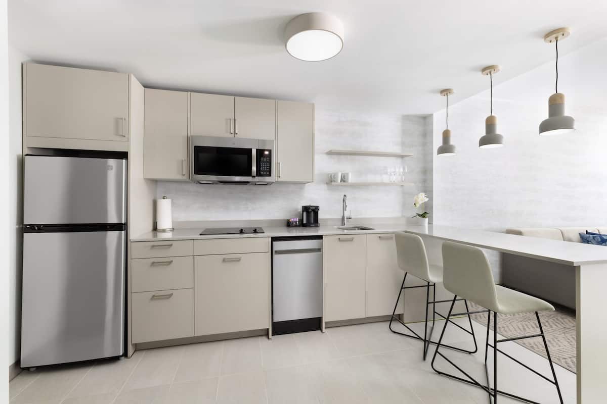 studio, 2 queen beds | private kitchen | fridge, microwave, stovetop, dishwasher