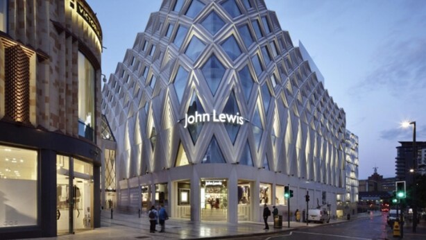 A modern building with a distinctive geometric facade and the name "John Lewis" prominently displayed.
