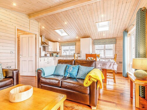 Walnut Lodge is a delightful 2-bedroom Nordic Style lodge sleeping 4 persons.