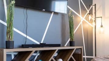 Iron/ironing board, travel crib, free WiFi, bed sheets