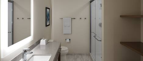 A modern bathroom with a large mirror, a sink, a toilet, and a shower area.