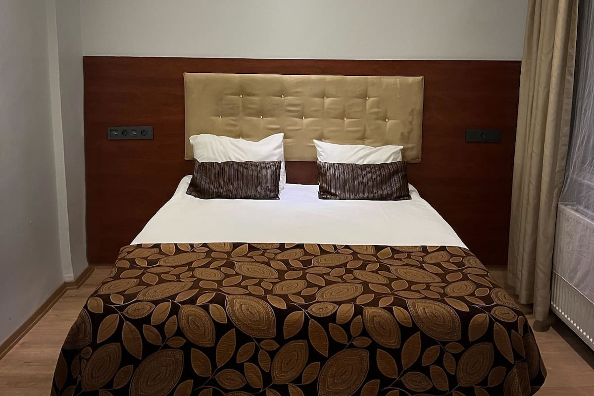 Quarto standard | Wi-Fi de cortesia, roupa de cama