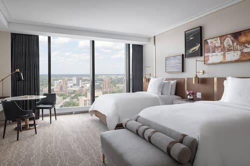 Premium bedding, down duvets, pillow-top beds, minibar