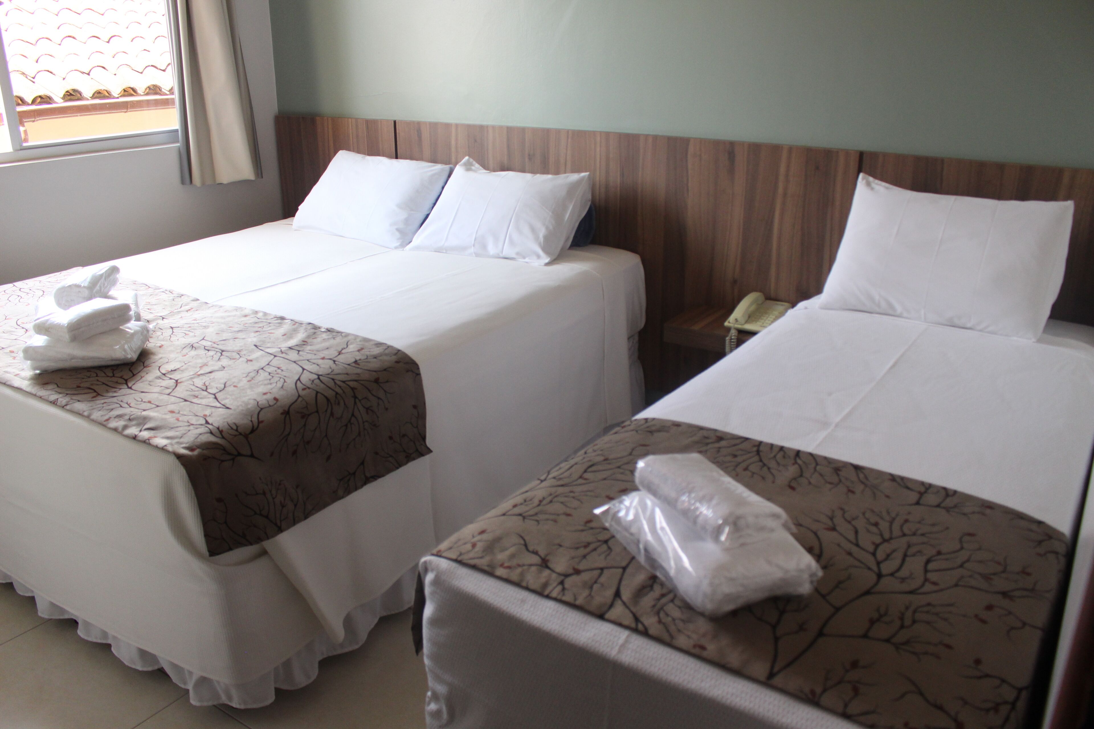 Standard Triple Room | Minibar, individually furnished, desk, laptop workspace