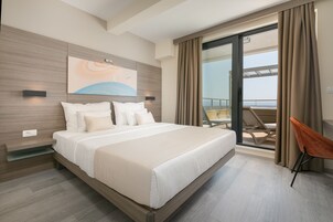 Penthouse Suite with Terrace and Sea View | Minibar, in-room safe, desk, laptop workspace