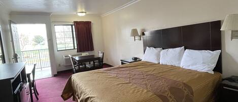 Desk, laptop workspace, free WiFi, bed sheets