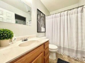 Combined shower/tub